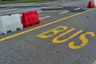 Bus rams barriers as driver falls asleep; fuel leak leaves road slippery in Marikina