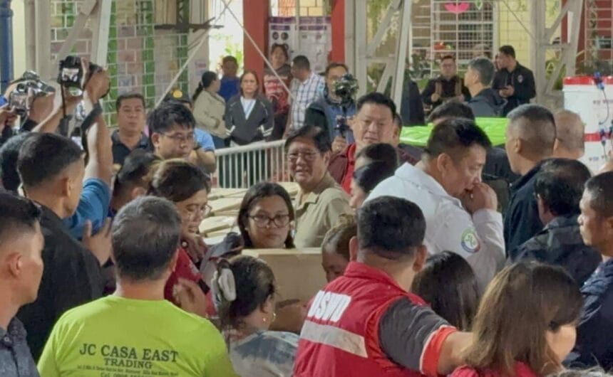 Marcos visits Rizal school to check on evacuees after flooding